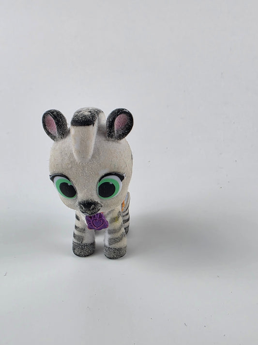 Disney Junior T.O.T.S. (Tiny Ones Transport Service) collectible mini figure Zigi the Zebra.