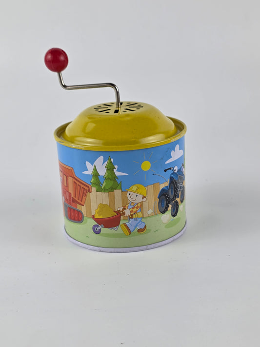 vintage Bob the Builder themed tin music box.