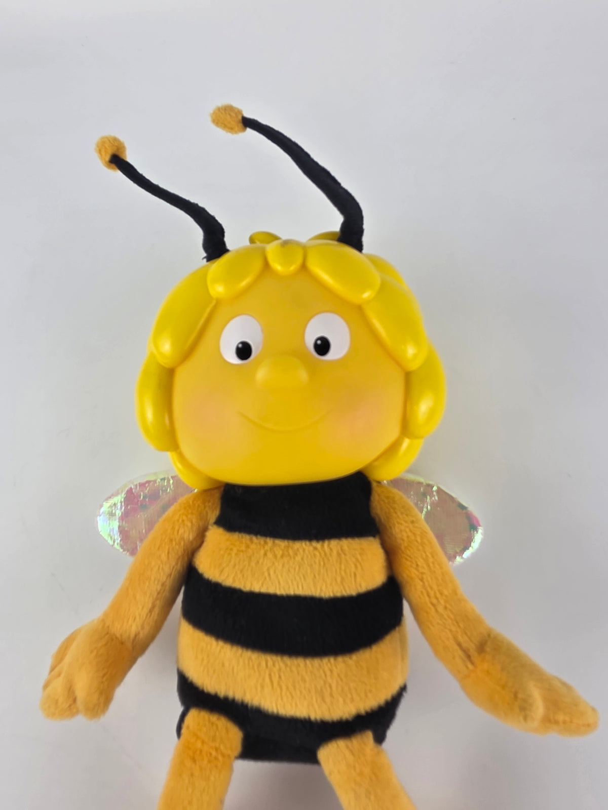 Maya the Bee interactive plush doll featuring a molded plastic head